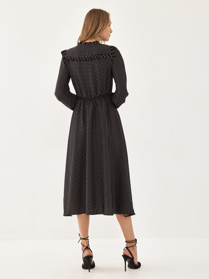 שמלה נקודות בצבע שחור