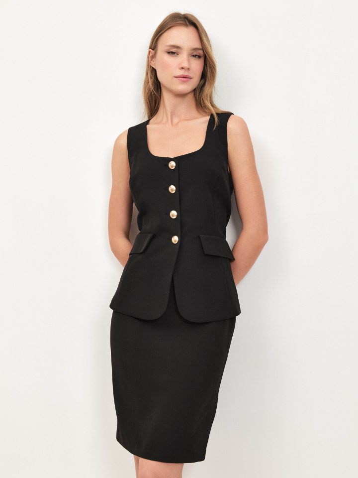 אוברול חצאית LINOR בצבע שחור