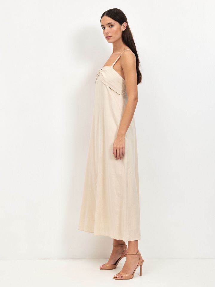 שמלה מראה פישתן פתח פפיון בצבע טיבעי