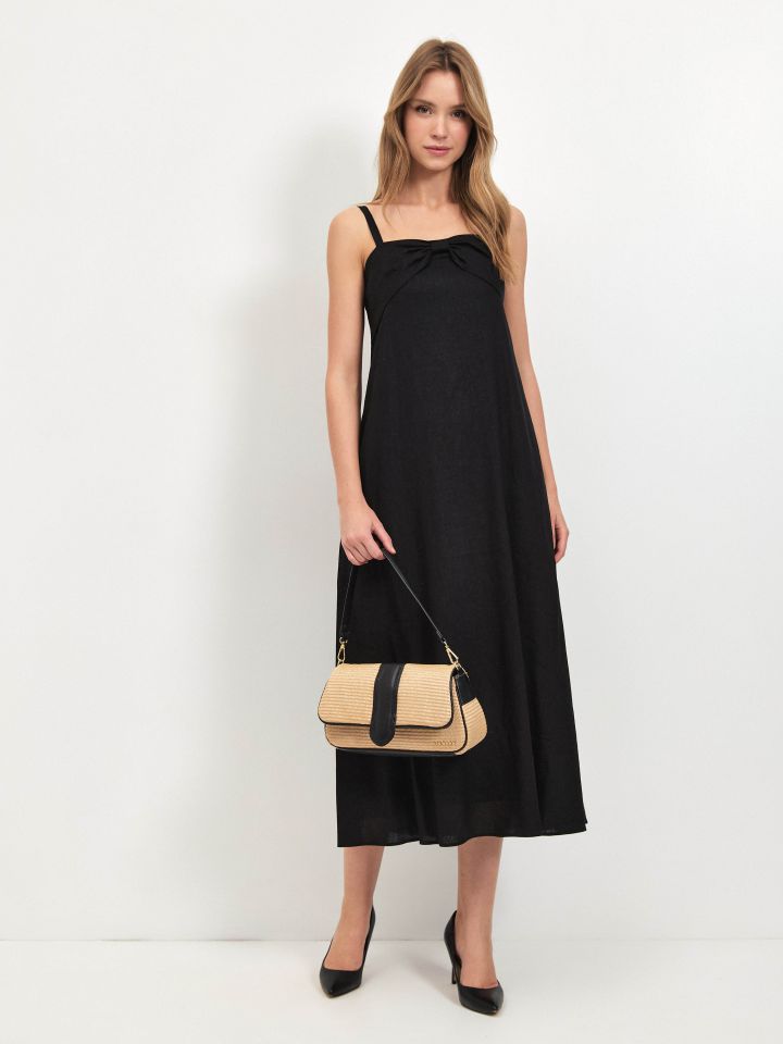 שמלה מראה פישתן פתח פפיון בצבע שחור