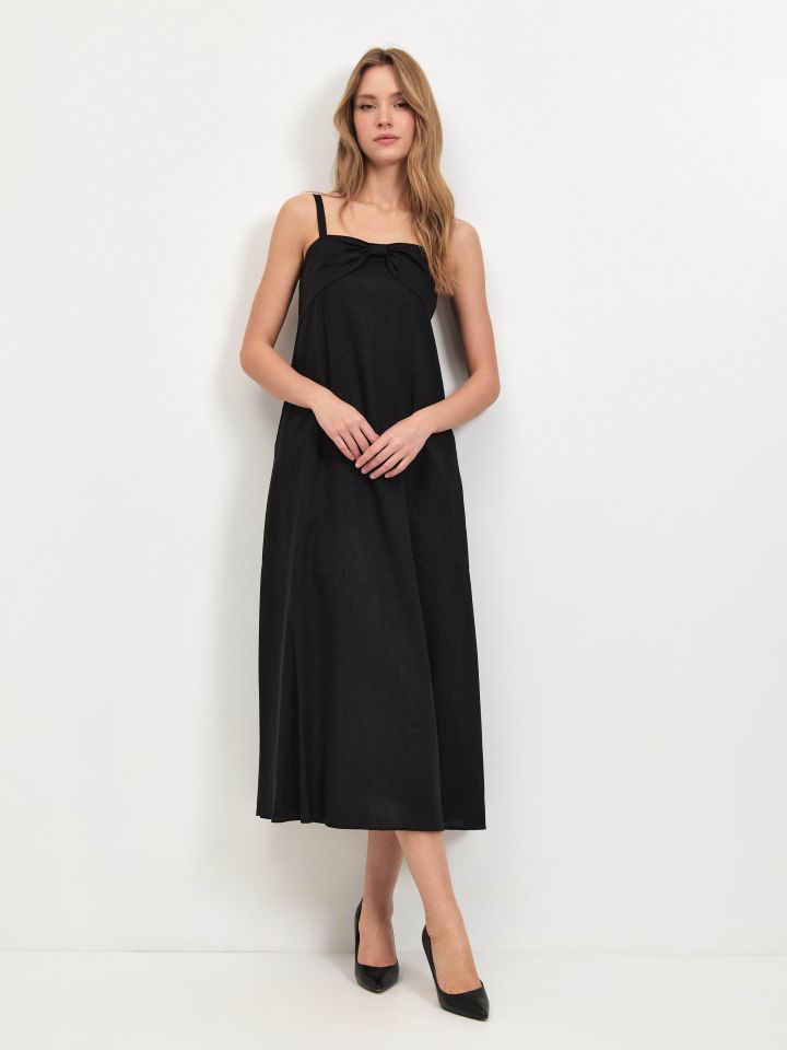 שמלה מראה פישתן פתח פפיון בצבע שחור