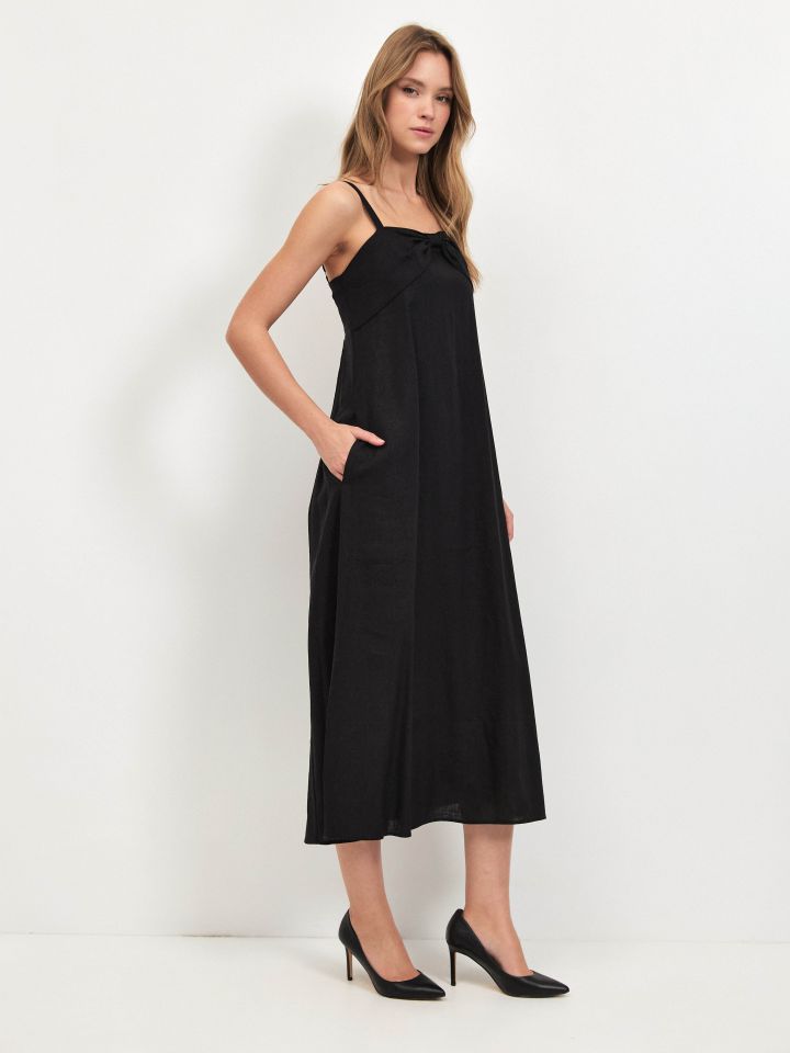 שמלה מראה פישתן פתח פפיון בצבע שחור