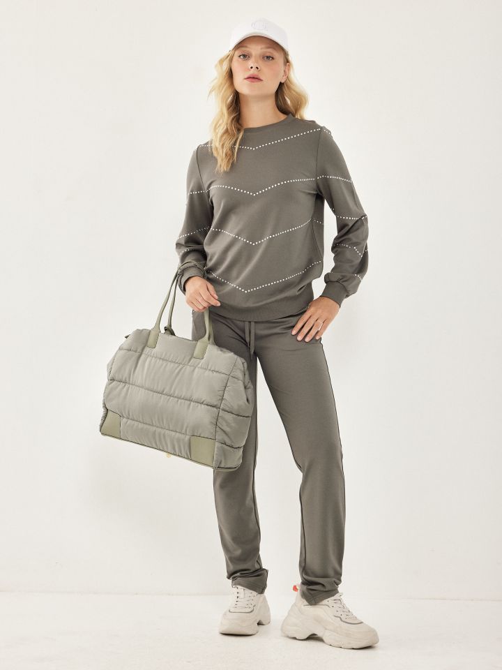 חליפת פנאי שילוב ניטים בצבע ירוק גולברי