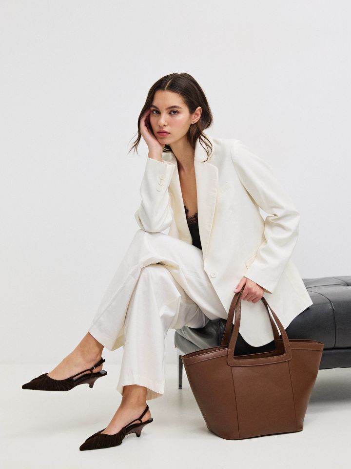 ג’קט דמוי פישתן כפתור אחד בצבע אופוויט