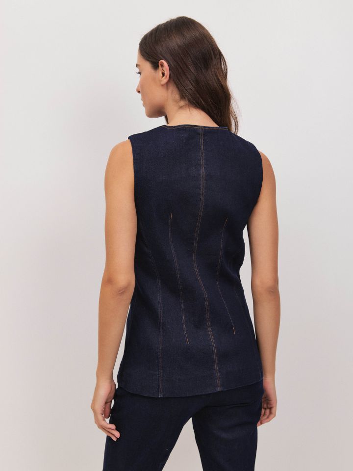 וסט ג’ינס כפתורים בצבע ג’ינס כהה