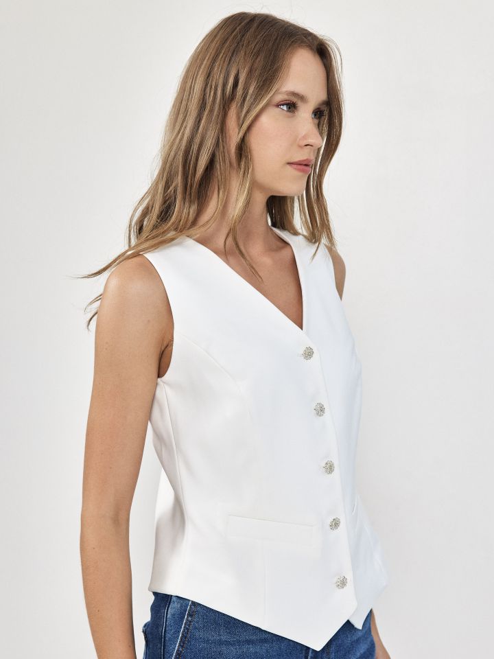 וסט דמוי יהלומים בצבע לבן