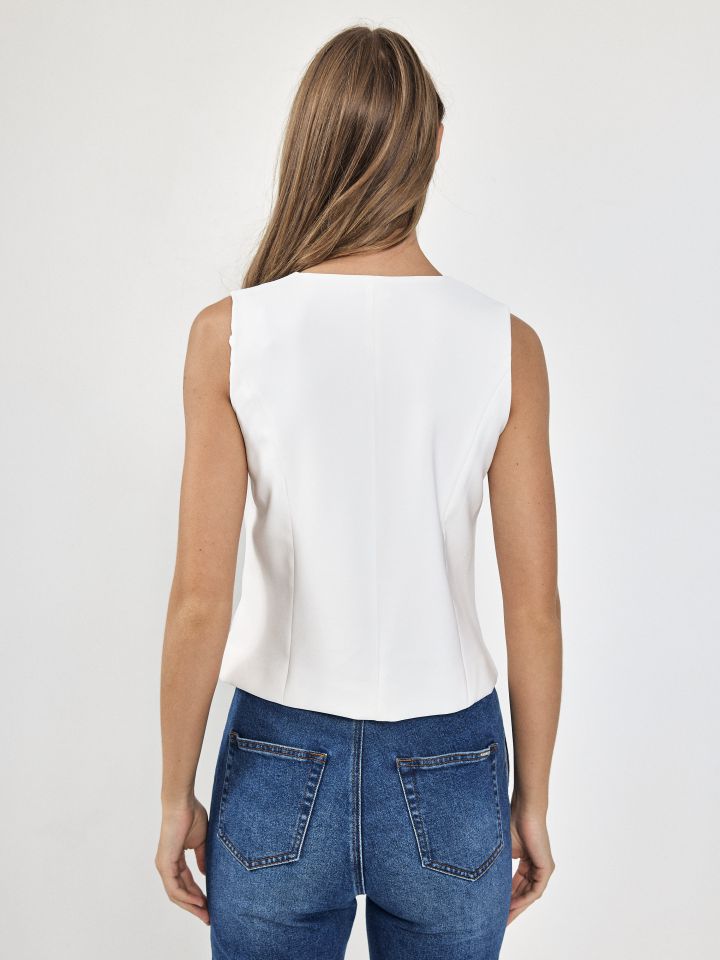 וסט דמוי יהלומים בצבע לבן