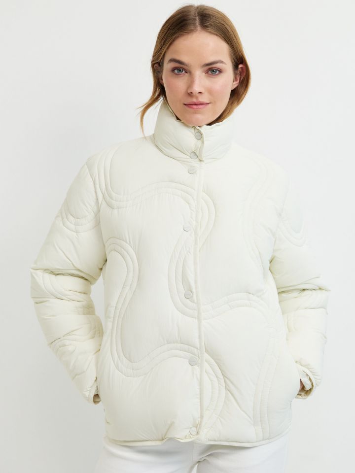 מעיל תפורים גלים PROMO בצבע שמנת