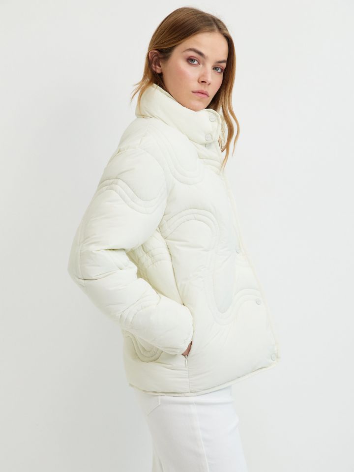 מעיל תפורים גלים PROMO בצבע שמנת