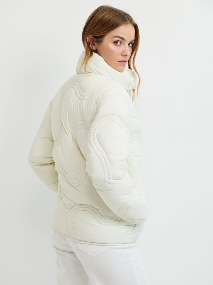 מעיל תפורים גלים PROMO בצבע שמנת