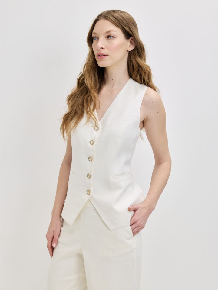 וסט מראה פישתן כפתורים בצבע שמנת