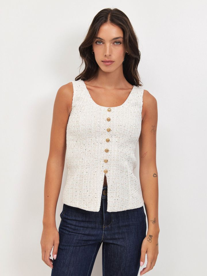 וסט לורקס כפתורים בצבע אופוויט