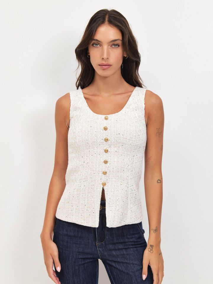 וסט לורקס כפתורים בצבע אופוויט