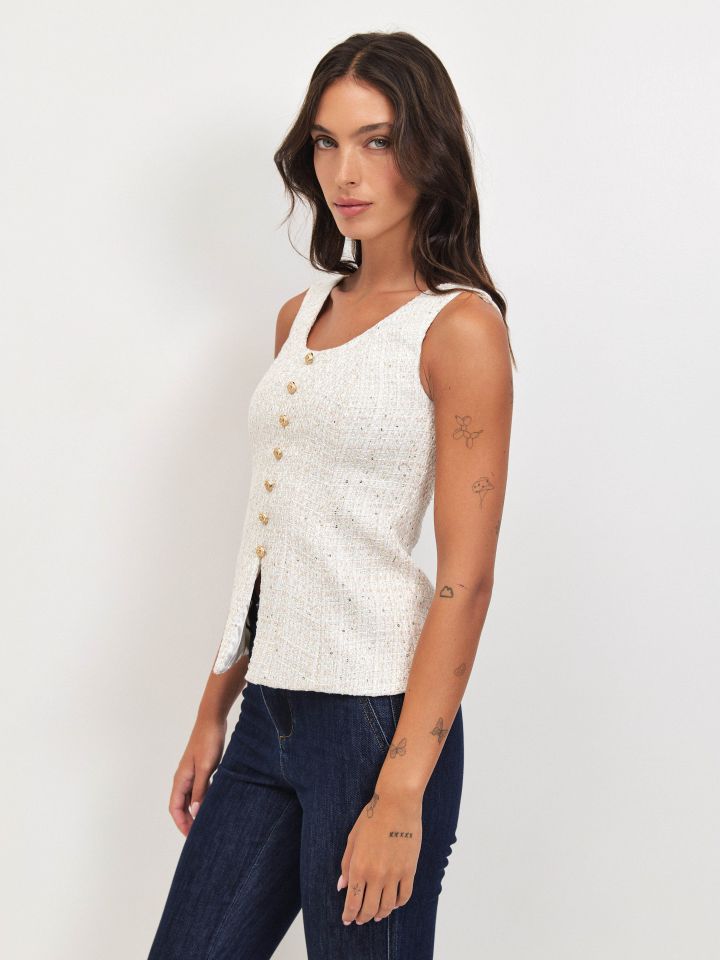 וסט לורקס כפתורים בצבע אופוויט