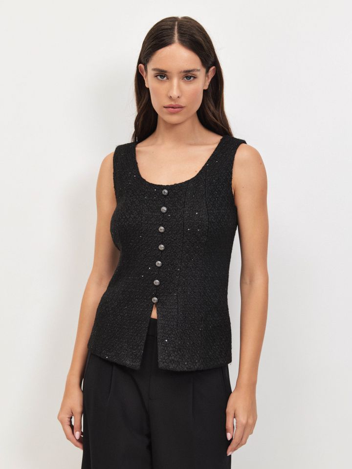 וסט לורקס כפתורים בצבע שחור