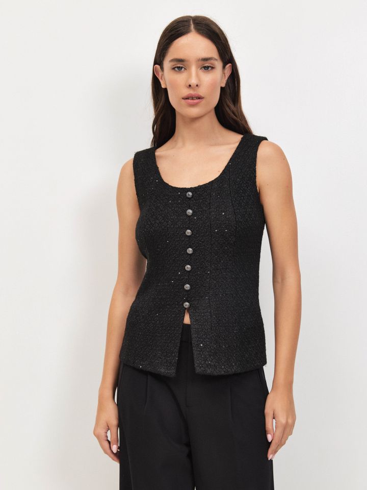 וסט לורקס כפתורים בצבע שחור