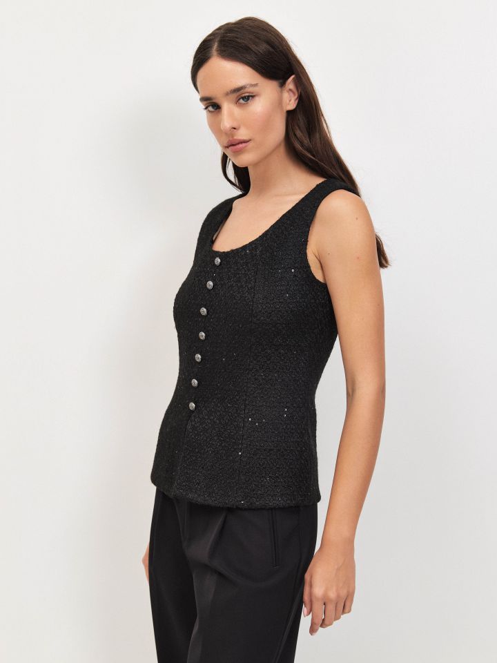 וסט לורקס כפתורים בצבע שחור