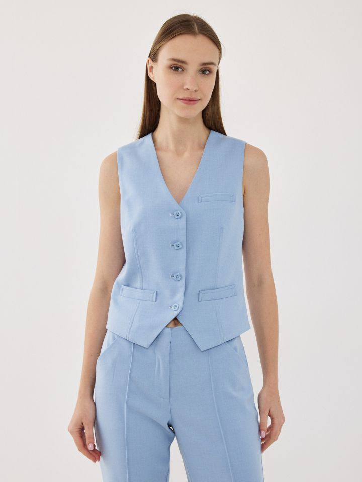 וסט כפתורים בצבע כחול מעושן