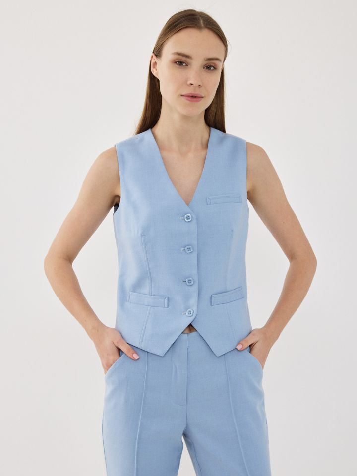 וסט כפתורים בצבע כחול מעושן