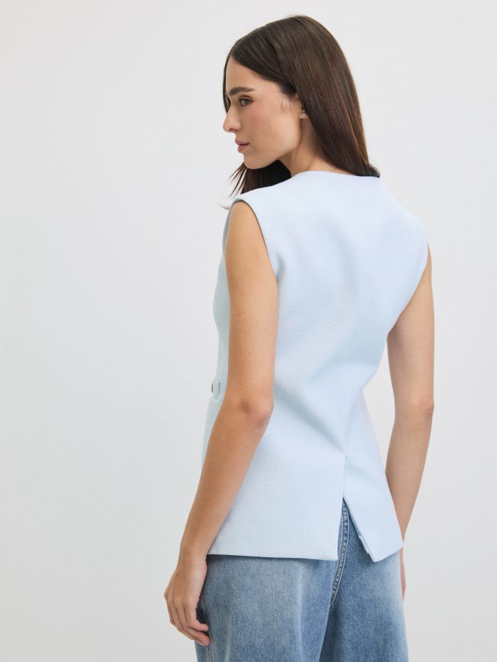 וסט RANI כפתורים בצבע תכלת