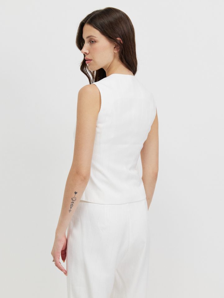 וסט פייטים בצבע אופוויט