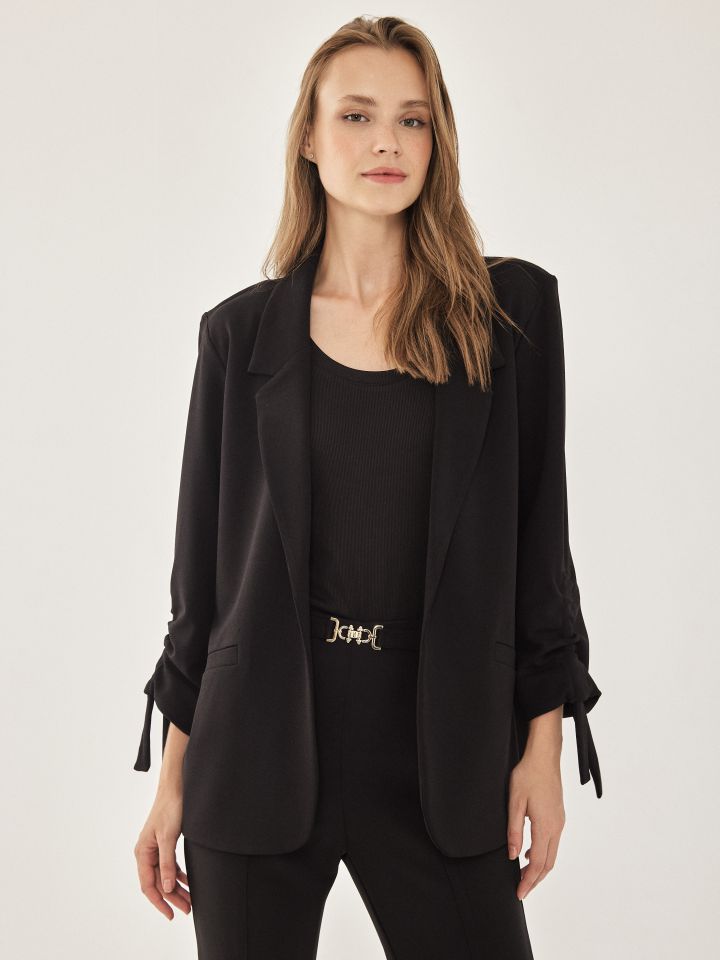 ג’קט סקובה  כיווץ בשרוול PROMO בצבע שחור