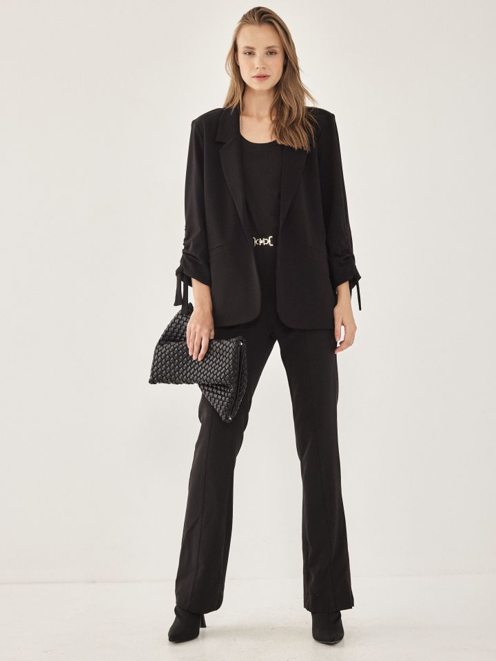 ג’קט סקובה  כיווץ בשרוול PROMO בצבע שחור