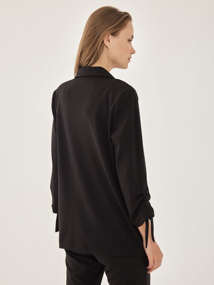 ג’קט סקובה  כיווץ בשרוול PROMO בצבע שחור