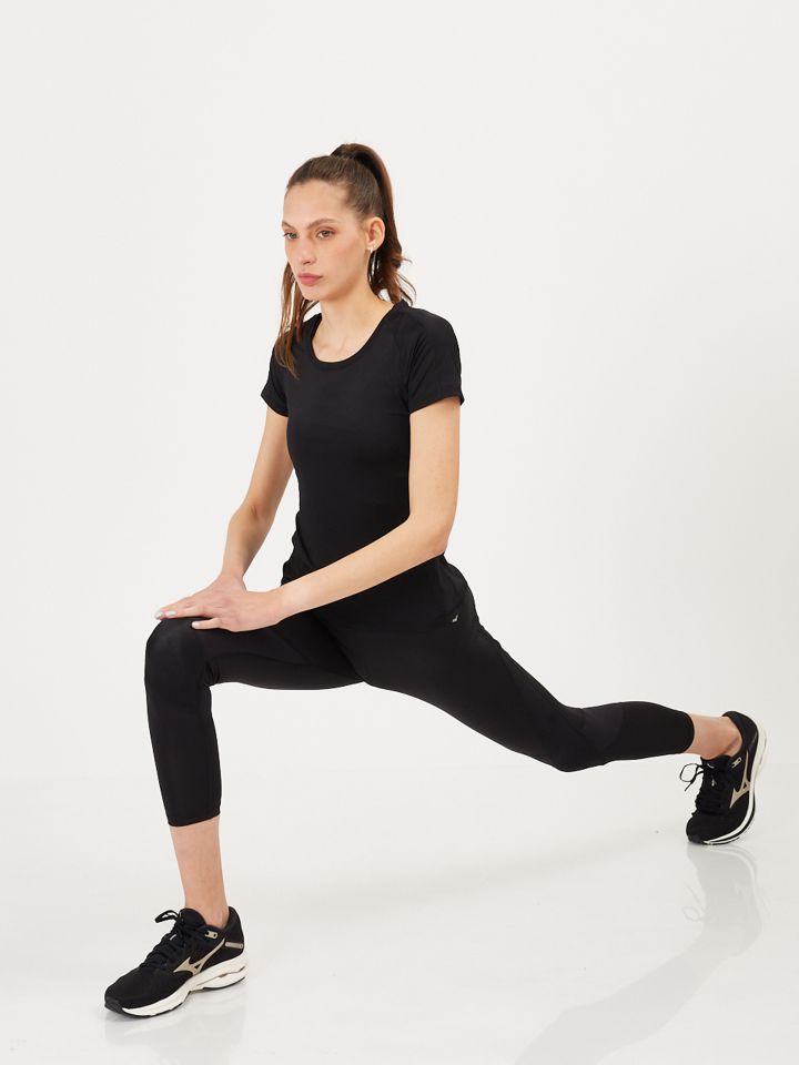 טי שירט פולי ספנדקס-נשים ארנה בצבע שחור