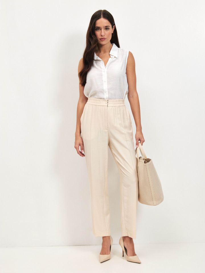 מכנסיים גומי בגב בצבע בייז’