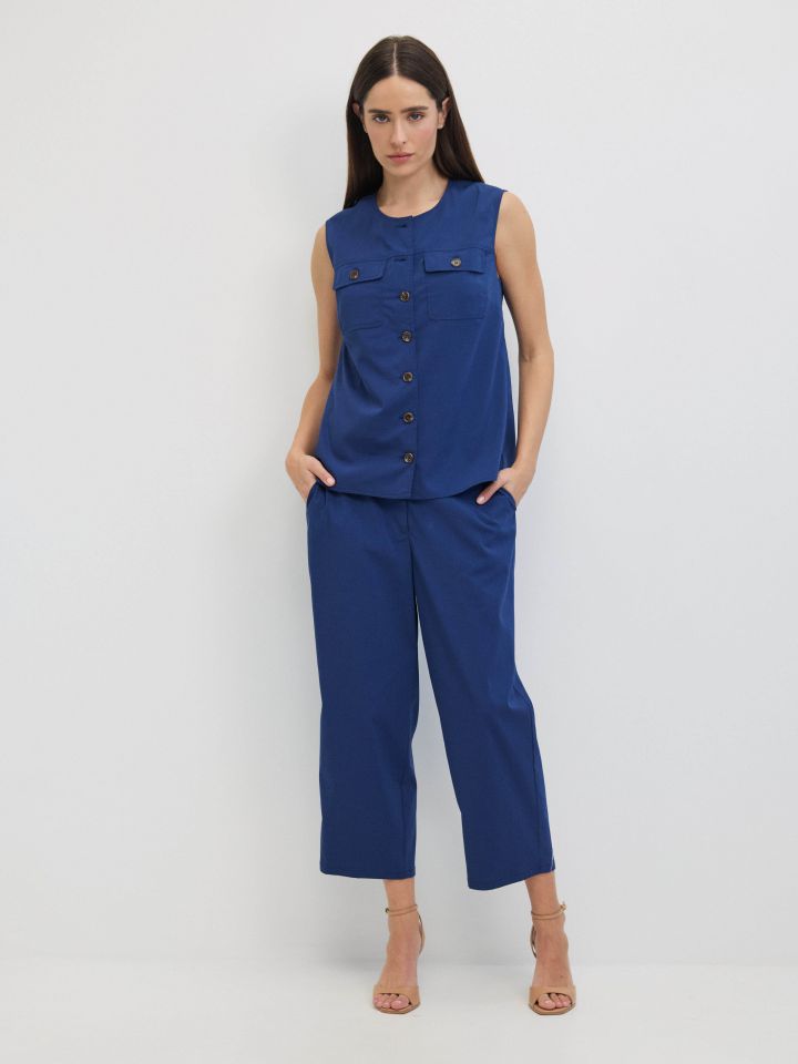 מכנסיים כיסי צד 8/9 בצבע כחול אינדיגו