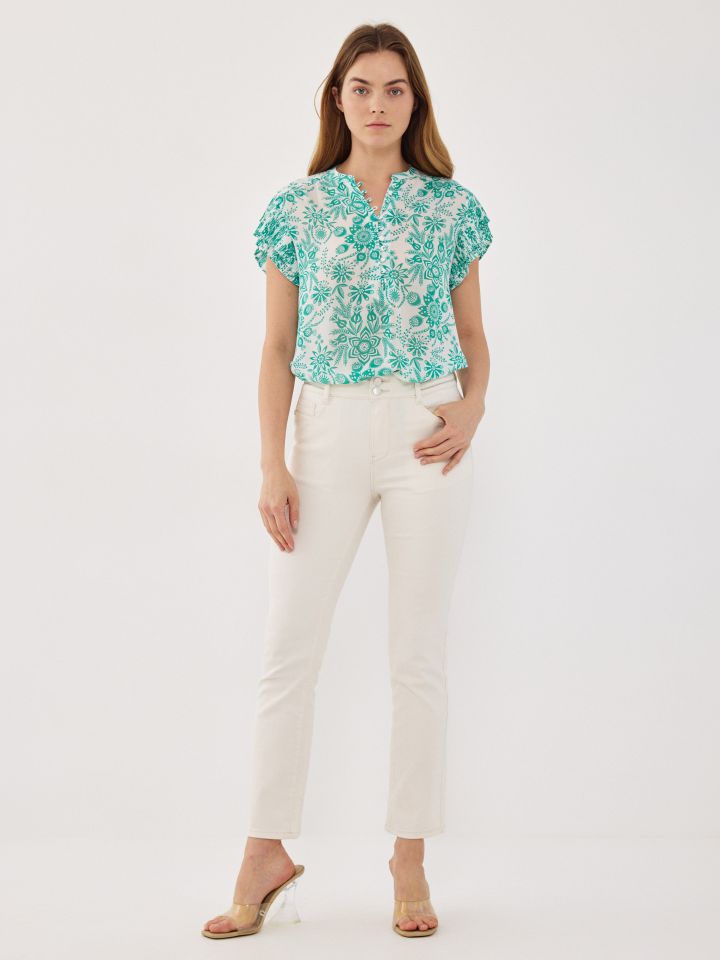 מכנסיים דריל סרטי לורקס בחגורה 7/8 בצבע שמנת