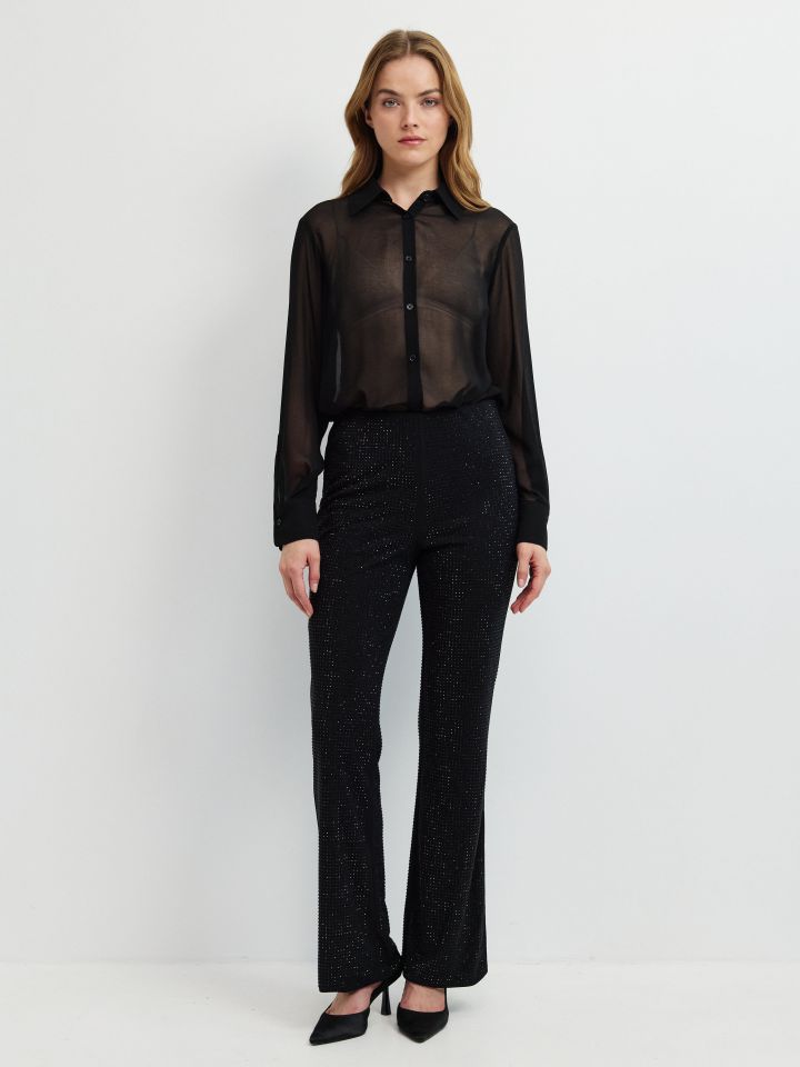 מכנסיים מראה דמוי יהלומים בצבע שחור