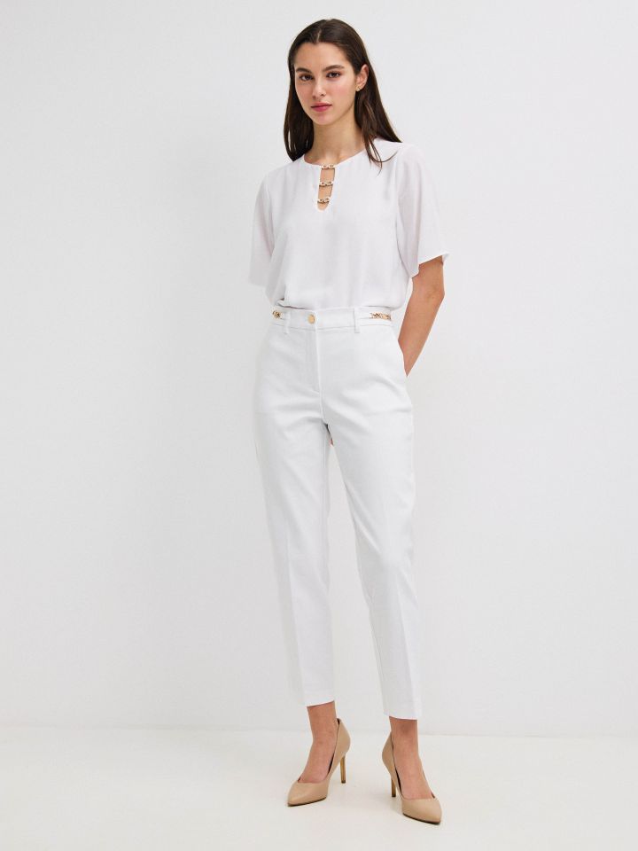 מכנסיים 7/8 אבזמים בצבע לבן