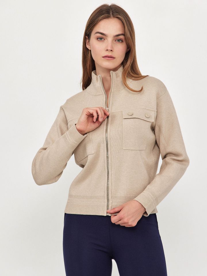 קרדיגן סריג כיסים ורוכסן בצבע בייז’