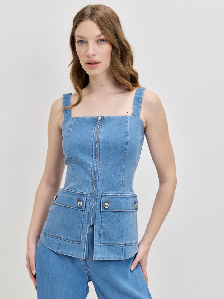 וסט ג’ינס רוכסן בצבע ג’ינס בהיר